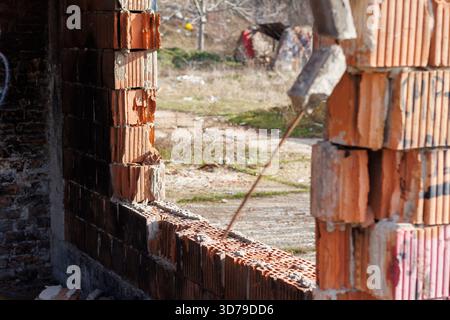 destroyed building after fire with large window Stock Photo