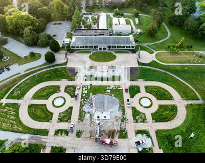This image captures the serene beauty of the historic Garfield Park in Indianapolis, Indiana, during the early morning. Stock Photo