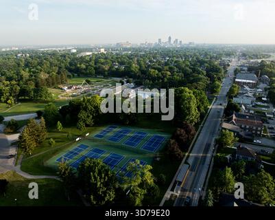 This image captures the serene beauty of the historic Garfield Park in Indianapolis, Indiana, during the early morning. Stock Photo