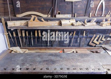 Craftsman tools arranged for woodworking tasks in a workshop environment Stock Photo