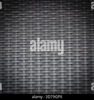 Grey basket weave pattern. Vignette. Textured Background. Stock Photo