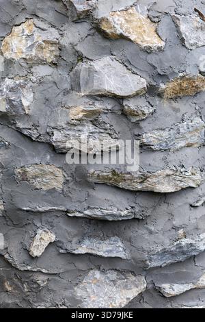 Stone wall texture with plaster background Stock Photo