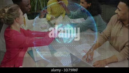 Collaborating 5 colleagues wearing business casual interacting in office with hologram globe, notes Stock Photo