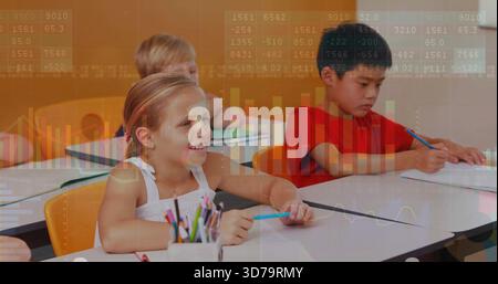 Smiling girl in white top writing on worksheet in classroom, with colored pencils, data overlays Stock Photo