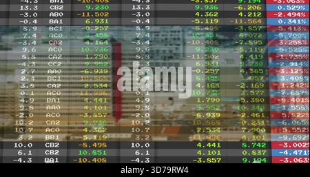 Displaying semi-transparent stock ticker grid overlaying downtown street, showing cars, pedestrians Stock Photo