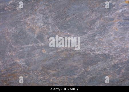 Captivating texture of natural stone with subtle hues and patterns from nature's artistry. Stock Photo