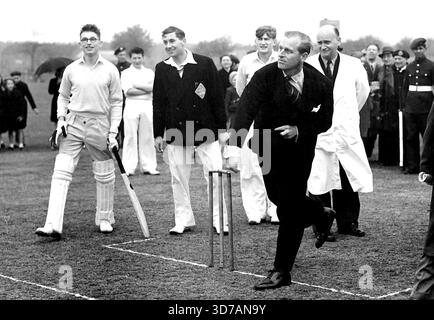 Duke "Drops In" To Open New Sports Centre -- His Royal Highness the Duke of Edinburgh seen bowling the first ball on the Cricket Table, after opening Stock Photo