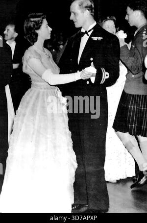 Princess Elizabeth And Her Fiance Dance Together In Edinburgh -- Princess Elizabeth and her fiance Lieutenant Philip Mountbatten dancing together at the ball - the first time they have been photographed dancing together.Princess Elizabeth and her fiance Lieutenant Philip Mountbatten led the dancing in a ball at the Assembly rooms in Edinburgh. The royal family and Lieutenant Mountbatten are playing a visit to Scotland and are staying at Holyrood House. July 15, 1947. Stock Photo