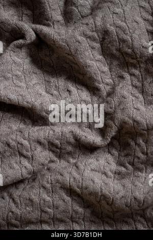 Abstract textured brown knitted background  Stock Photo
