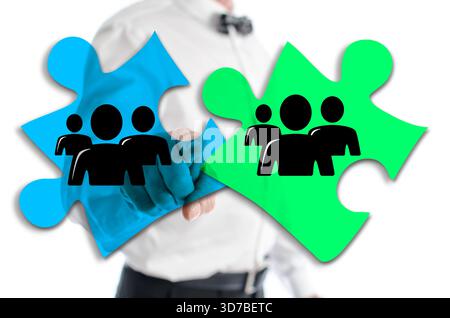 Teamwork concept shown by a man in background Stock Photo
