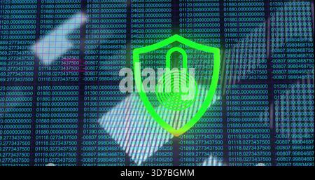 Displaying green shield with padlock fingerprint on screen, hands hovering in longsleeve shirt Stock Photo