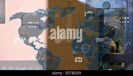 Displaying tech map UI on control screen showing hex grid, device reflection wearing dark top Stock Photo