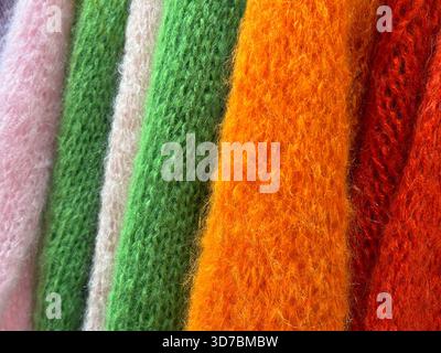Knitted warm sweaters colorful clothes Stock Photo