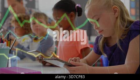 Focusing blonde girl in purple top using tablet in classroom, with line-chart overlay, copy space Stock Photo