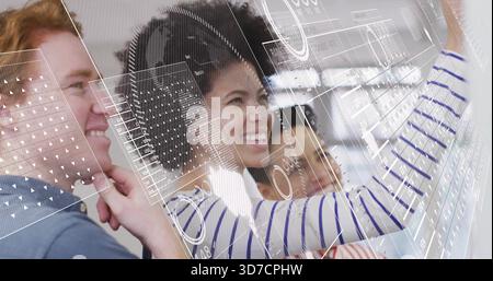 Tapping central woman wearing white navy striped top using glass board at lab, showing UI overlays Stock Photo