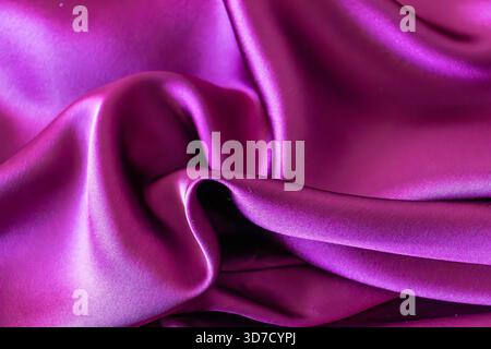 Black dark deep burgundy ruby cherry violet purple plum abstract background. Silk satin velvet fabric. Elegant luxury rich Stock Photo