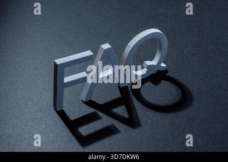 Wooden letters forming the word FAQ acronym for Frequently Asked Questions. Customer support, information access, help, answers, and common inquiries Stock Photo