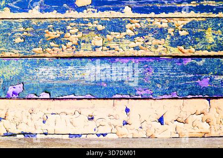Texture background of pink peeling paint, close-up of cracked paint on old wood surface Stock Photo
