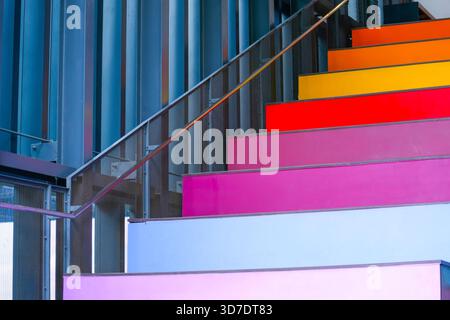 Colorful multicolor stairs warm gradient tint, different heights of steps. Stock Photo
