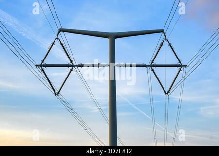 Close-up of a modern T-pylon and diamond-shaped conductor arrangement on the Somerset Levels, England, for the Hinkley Connection Project Stock Photo