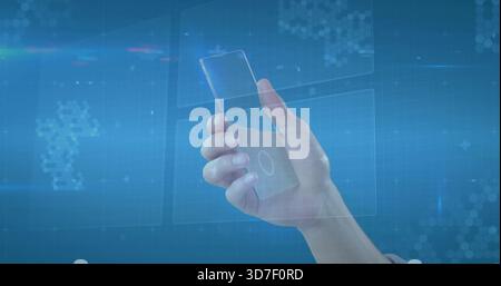 Displaying adult right hand pressing touch icon on clear phone in blue tech backdrop, light sleeve Stock Photo