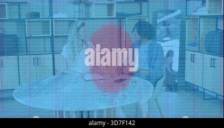 Sitting couple talking in kitchen, man in light blue shirt, woman in white blouse, red fingerprint Stock Photo