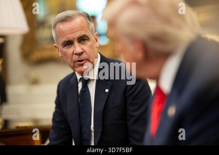 President Donald Trump meets with Canadian Prime Minister Mark Carney, Tuesday, May 6, 2025, in the Oval Office. Stock Photo