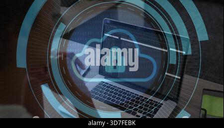 Displaying laptop showing code, cloud-lock overlay in home office, woman in light top leaning left Stock Photo