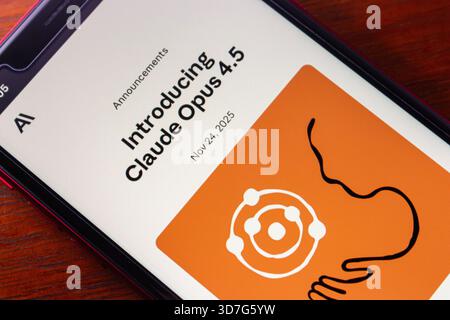 Quito, ECUADOR - Nov 25 2025 : Smartphone screen showing Claude Opus 4.5 AI release on November 24, 2025, with branding and interface in focus. Stock Photo