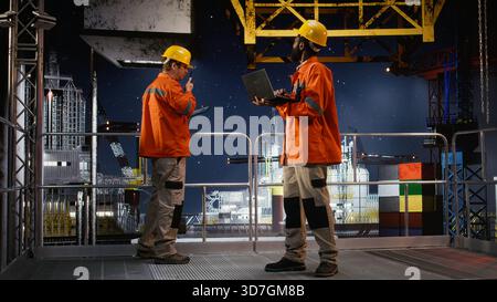Activity Measuring Rig Black engineer performing digital inspection of oil rig platform ...