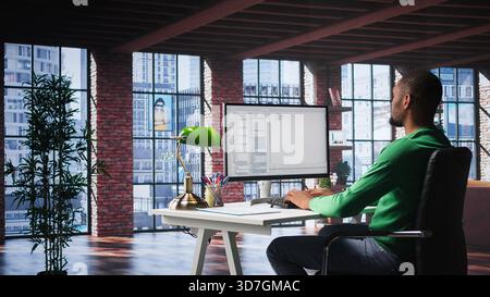 African American IT expert working with a computer full of code. Professional system engineer focuses on software development, debugging, encryption and system security at home. Camera B. Stock Photo
