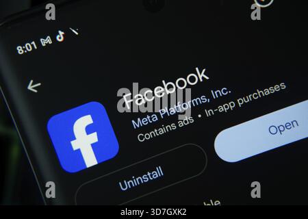 Dhaka, Bangladesh- 27 July 2025: Screen displaying Facebook app with open and uninstall options, dark interface Stock Photo