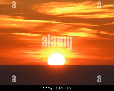 Sunset with orange sky over the Tyrrhenian Sea. Stock Photo
