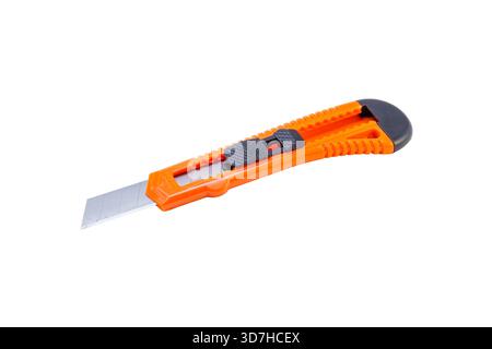 An orange and black retractable utility knife with a sharp, extended metal blade, isolated on white. Stock Photo