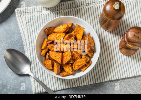 Homemade Thanksgiving Roasted Sweet Potatoes Ready to Eat in a Bowl Stock Photo