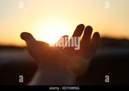 The brightly rising New Year's sunrise and Christian symbol fish ...