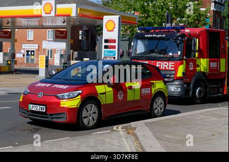 London Fire Brigade car and engine parked after an incident in Twickenham, London. Stock Photo