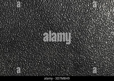 Steel surface with shiny black powder coating, abstract industrial background photo texture Stock Photo