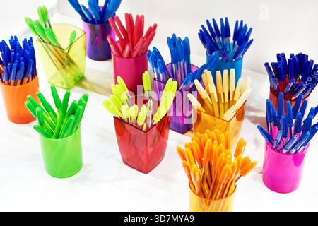Modern colored plastic ballpoint pens on store display Stock Photo