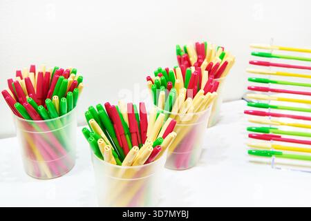 Modern colored plastic ballpoint pens on store display Stock Photo