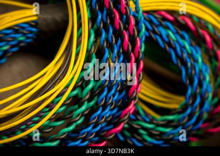 Colorful wiring bundle close up view electrical cables . Stock Photo