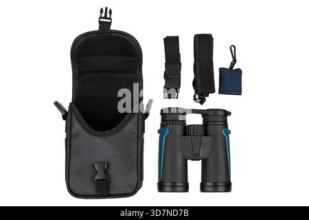 Binocular set with carrying case, straps, and cleaning cloth arranged on a white background. Stock Photo