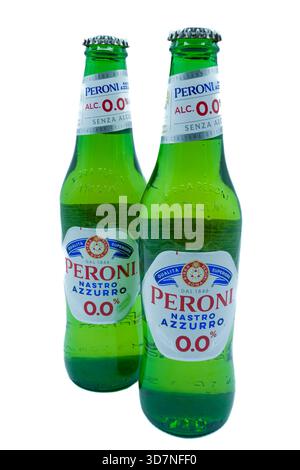 Irvine, Scotland, UK - November 17, 2025: Two Peroni Nastro Azzurro 0.0% beer in glass bottles and metal tops that are fully recyclable displaying the Stock Photo