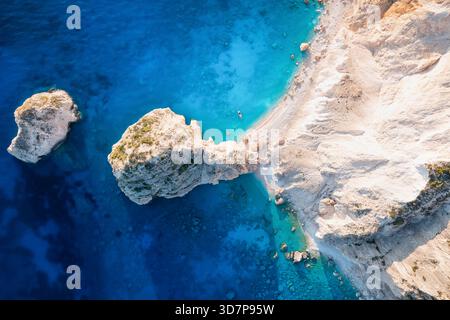 Aerial overhead view of the famous Mizithres rocks and beach at Keri, Zakynthos, Greece, during summer sunset time Stock Photo