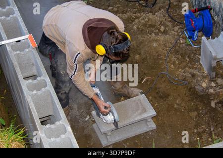 Grinding stones with an angle grinder Stock Photo