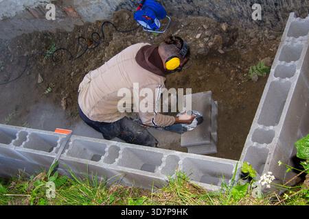 Grinding stones with an angle grinder Stock Photo