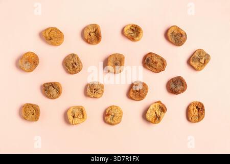 Sweet dried figs on orange background Stock Photo