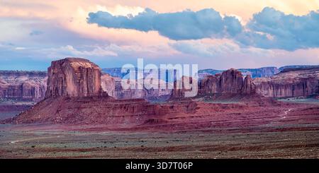 Monument Valley sunset US landscape - butte and red rock sandstone formations - southwest USA Arizona & Utah - United States Navajo national park Stock Photo