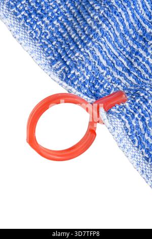 Blue terry towel with red plastic clothespin closeup isolated over white Stock Photo