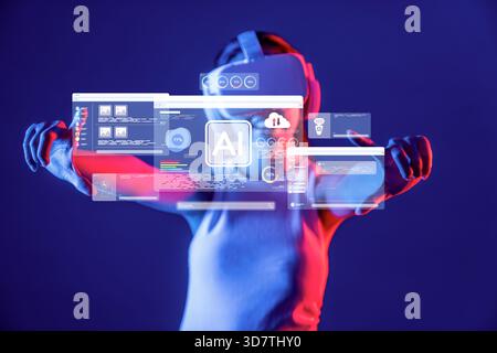 Explore the dynamic interplay of artificial intelligence and virtual reality as a user engages with a cutting-edge digital interface in an immersive s Stock Photo